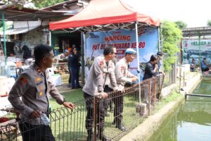 mbminvestigasi.com | Meriahkan Hari Bhayangkara ke-80, Polsek Kembangan Gelar Lomba Mancing Bersama Masyarakat