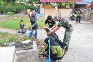 mbminvestigasi.com | Korem 132/Tadulako dan Warga Gotong Royong Bersihkan Gedung Juang Palu