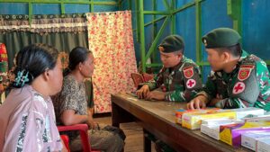 mbminvestigasi.com | Peringati HUT Ke-64, Satgas Pamtas RI-Malaysia Yonarmed 13/Nanggala Gandeng Puskesmas Badau Gelar Khitanan Massal dan Pengobatan Gratis di Desa Pulau Majang.