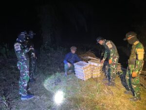 mbminvestigasi.com | Satgas Pamtas RI-Malaysia Yonarmed 19/Bogani Gagalkan Dugaan Penyelundupan 200 Ekor Burung Kacer di Perbatasan