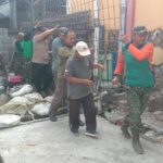 mbminvestigasi.com | Panas Matahari Menyengat, Semangat Tak Padamkan Satgas TMMD, Polri, Ormas dan Warga Masyarakat Kebut Pemasangan Hermest & Bodex
