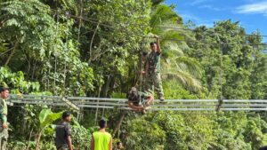 mbminvestigasi.com | Jembatan Gantung di Desa Hou Rampung, Perkuat Akses Warga Nias Lewat Program Bakti TNI AD Untuk Rakyat