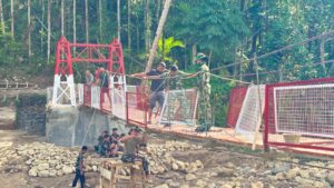 mbminvestigasi.com | Jembatan Gantung di Desa Hou Rampung, Perkuat Akses Warga Nias Lewat Program Bakti TNI AD Untuk Rakyat