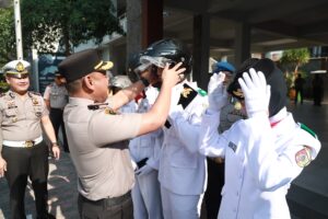 Mbminvestigasi.com | Polisi Bersama Masyarakat: Aksi Simpatik Polres Jember Edukasi Keselamatan Berkendara