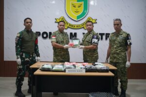 Mbminvestigasi.com | Satgas Yonarmed 19/Bogani Gagalkan Penyelundupan 32,2452 KG Sabu dan 4.867 Butir Ekstasi di Perbatasan RI–Malaysia